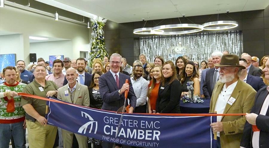 group photo cutting ribbon